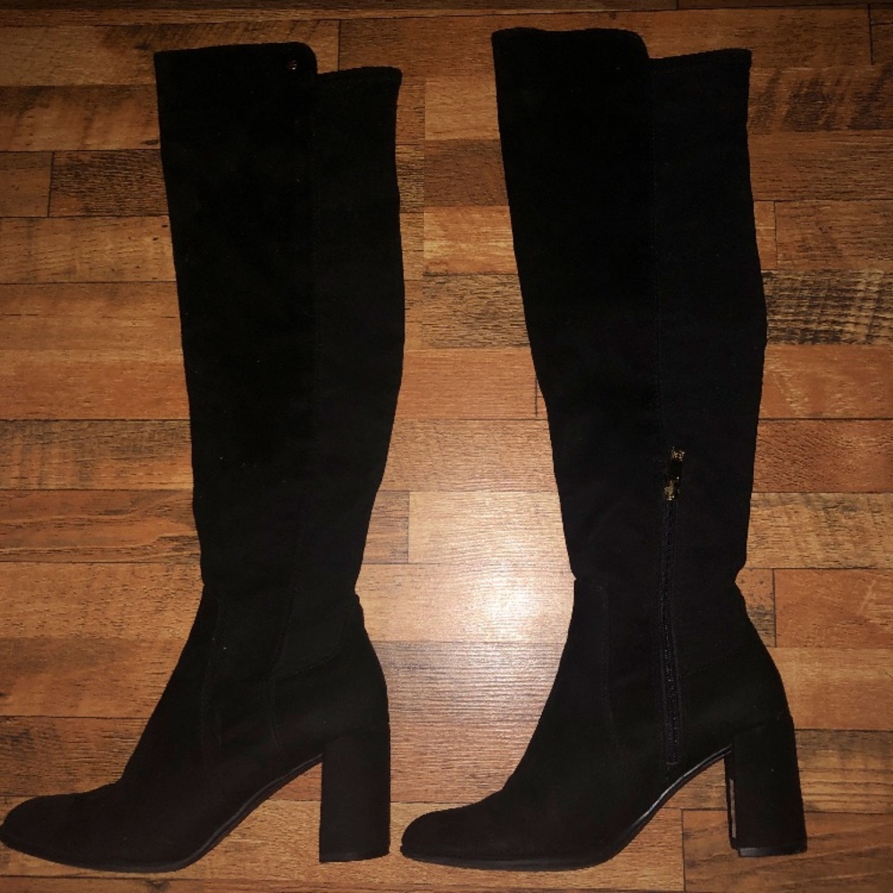Knee high black suede heeled boots